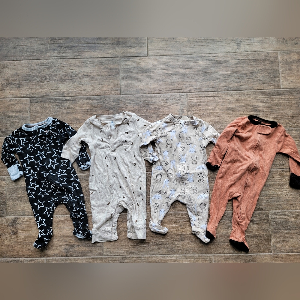 Four 0-3 month outfits